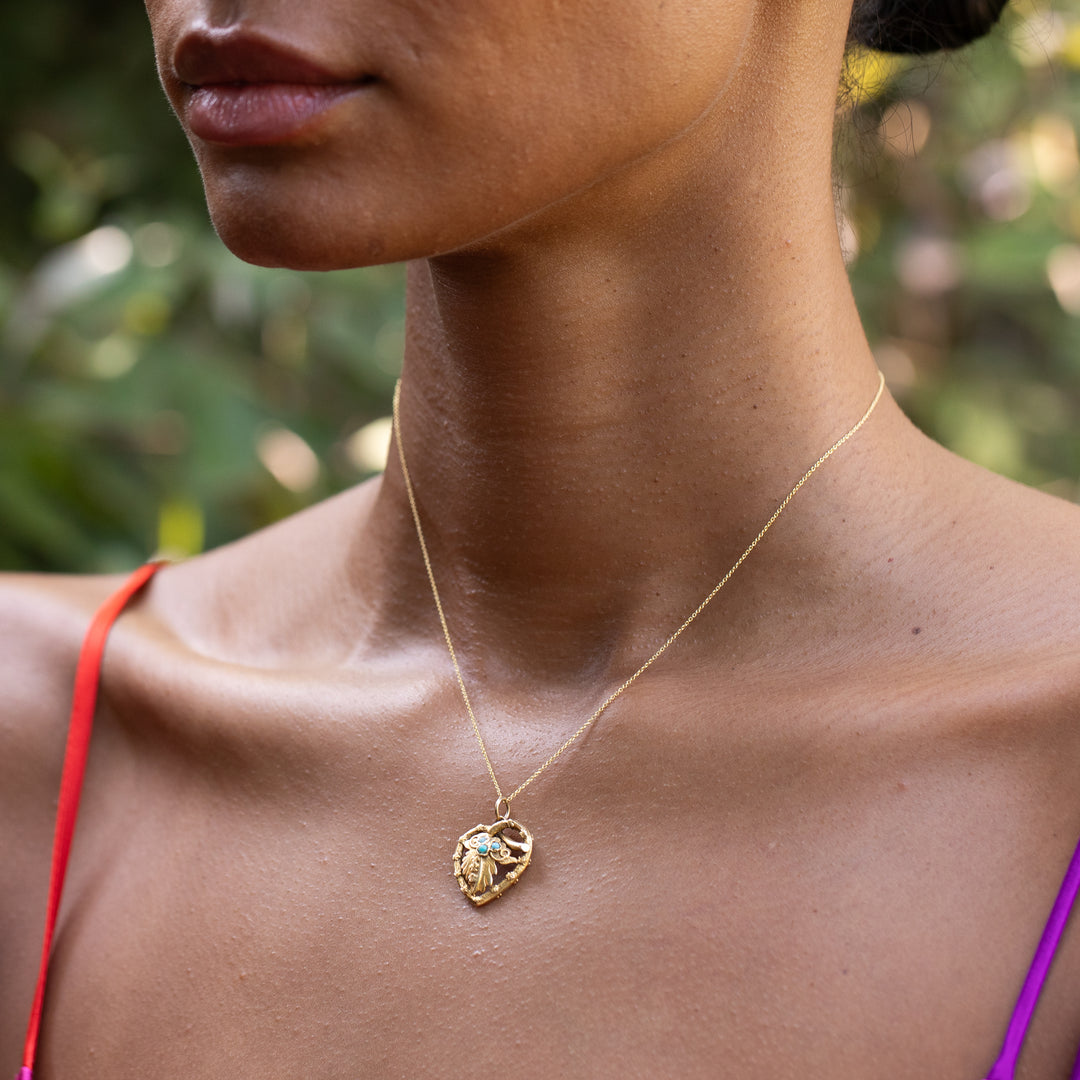 Turquoise and 14K Gold Heart And Leaf Charm