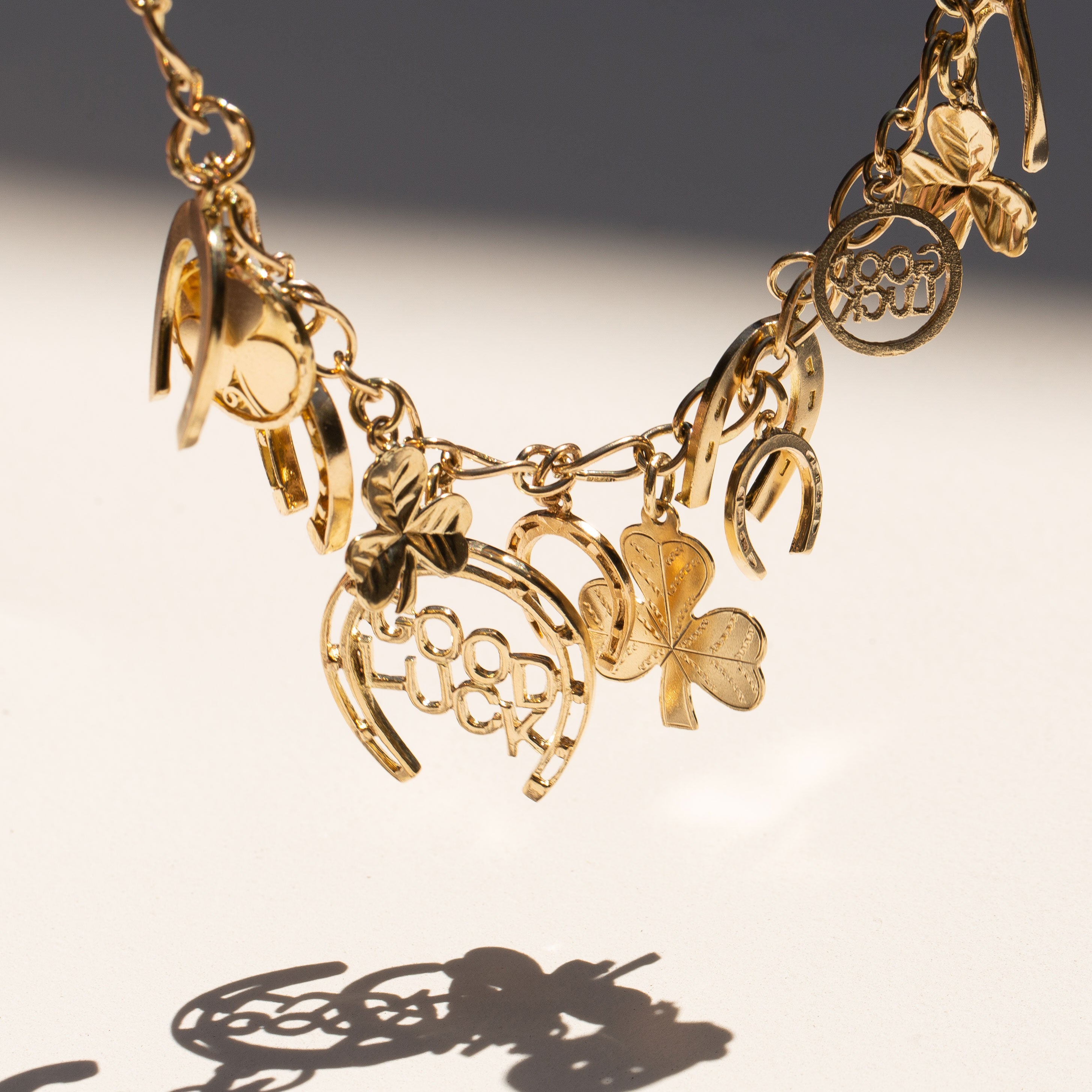 English Good Luck 9k Gold Charm Bracelet