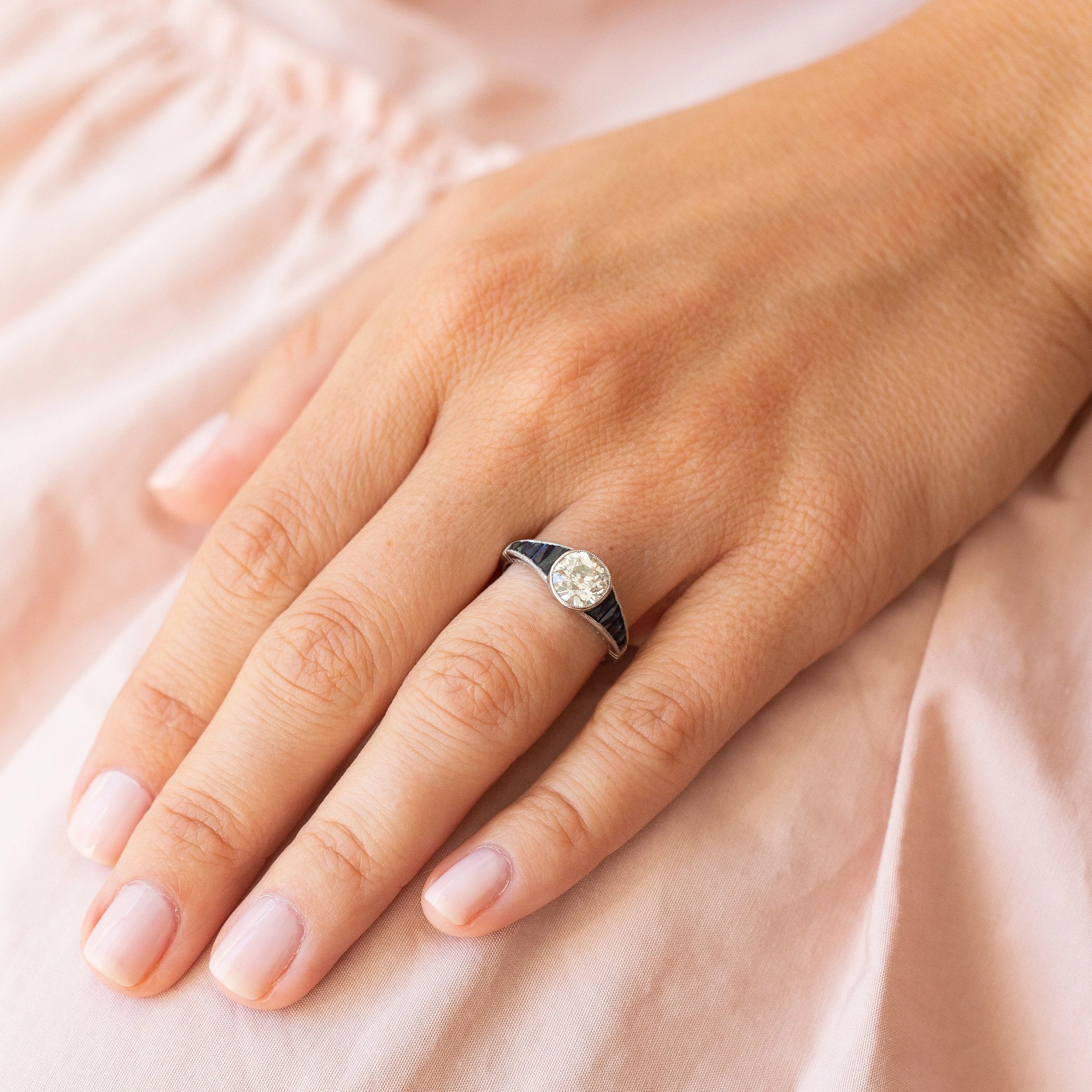 Art Deco 1.50 Carat Diamond and Sapphire Platinum Ring