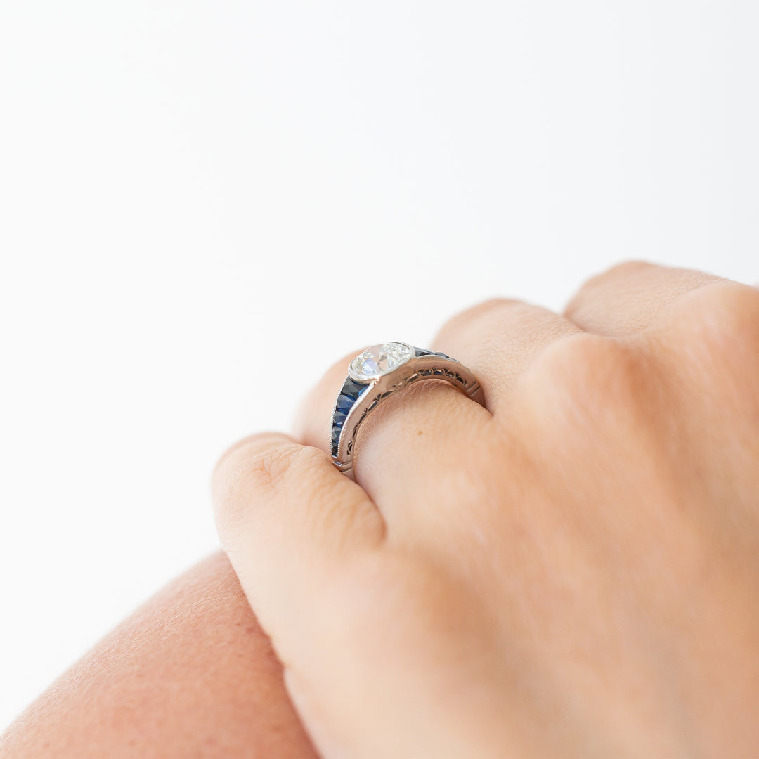 Art Deco 1.50 Carat Diamond and Sapphire Platinum Ring