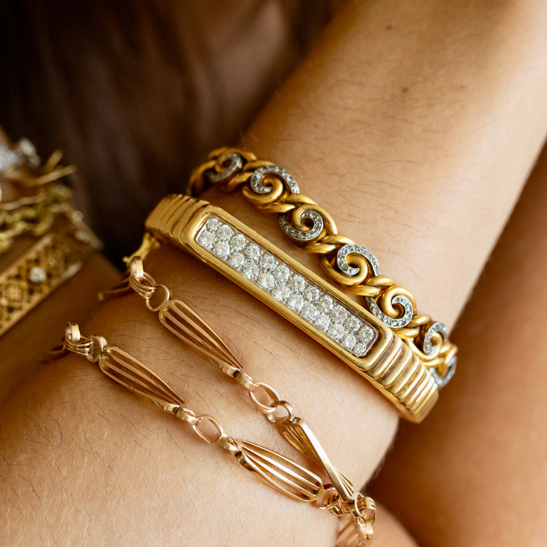 French 18K Gold and Diamond Swirl Link Bracelet