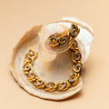 French 18K Gold and Diamond Swirl Link Bracelet