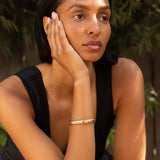 Art Nouveau Diamond, Emerald, and 14k Gold Bangle Bracelet