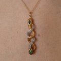 Victorian Snake Sapphire, Demantoid Garnet, Diamond, Ruby, Platinum, And 18K Gold Pendant