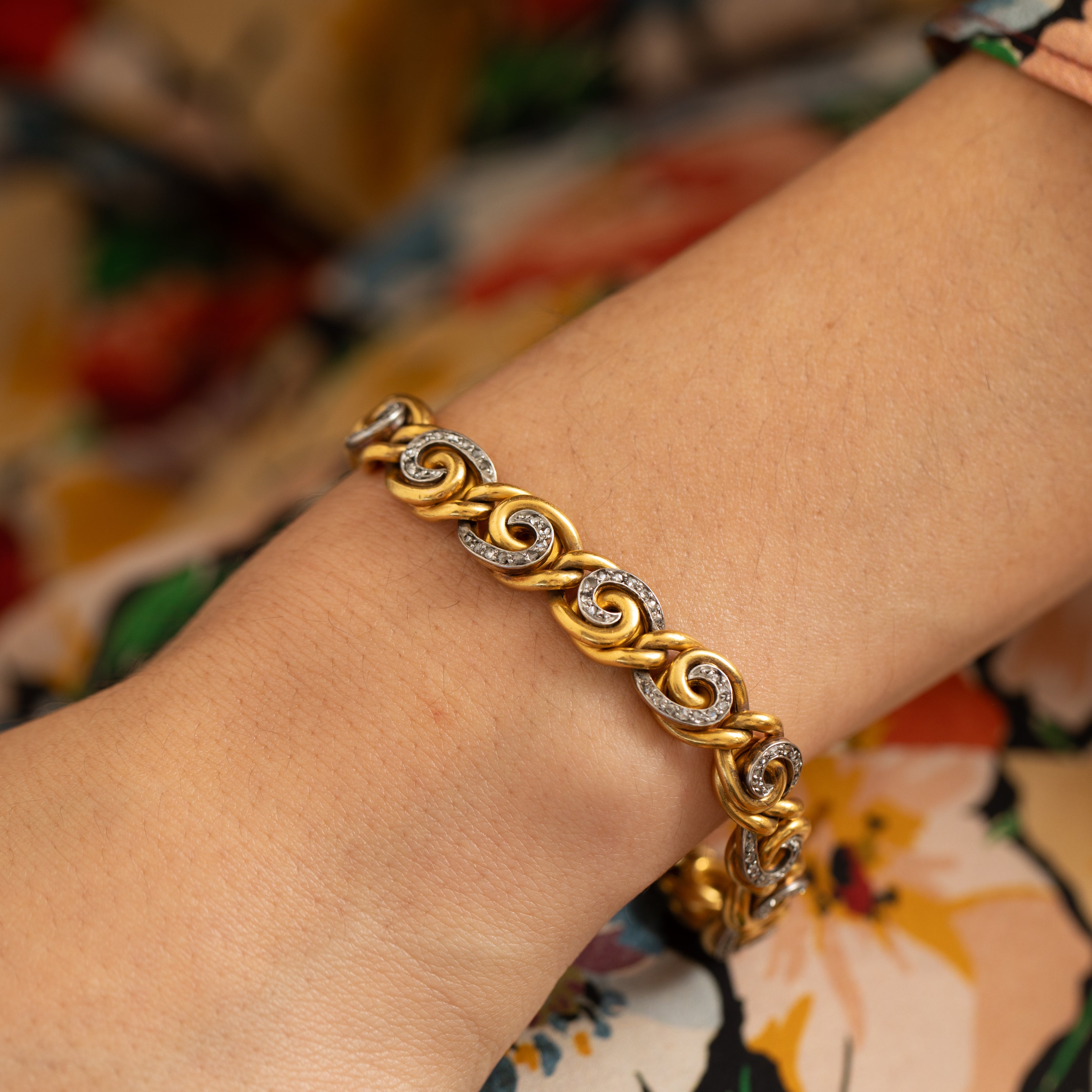 French 18K Gold and Diamond Swirl Link Bracelet