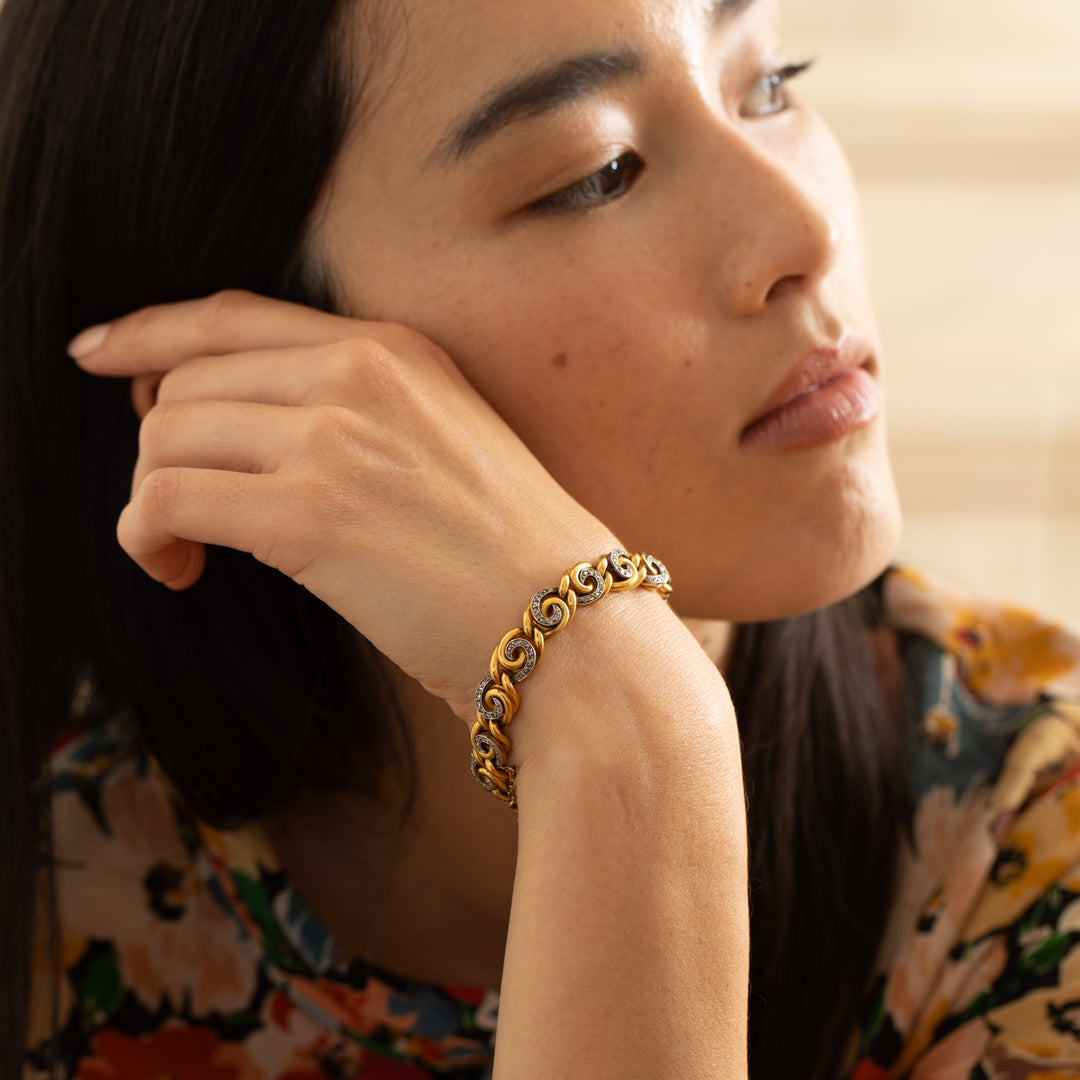 French 18K Gold and Diamond Swirl Link Bracelet