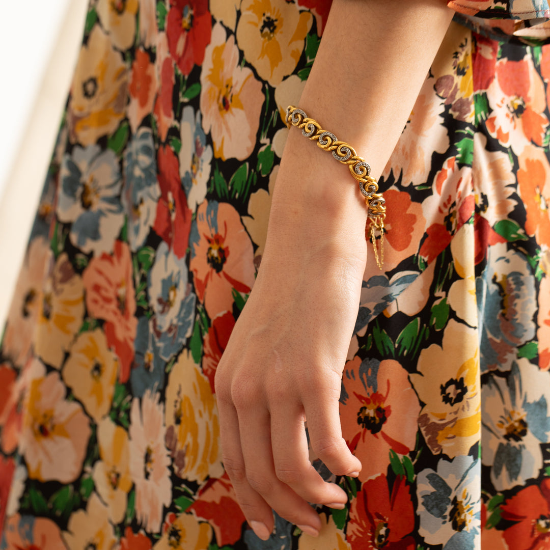 French 18K Gold and Diamond Swirl Link Bracelet