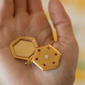 Early 20th Century Octagonal Rudy, Diamond, And 18K Gold Locket