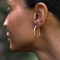 Hammered 14K Gold Oval Hoop Earrings