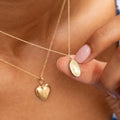 Miniature 10K Gold Oval Locket Charm