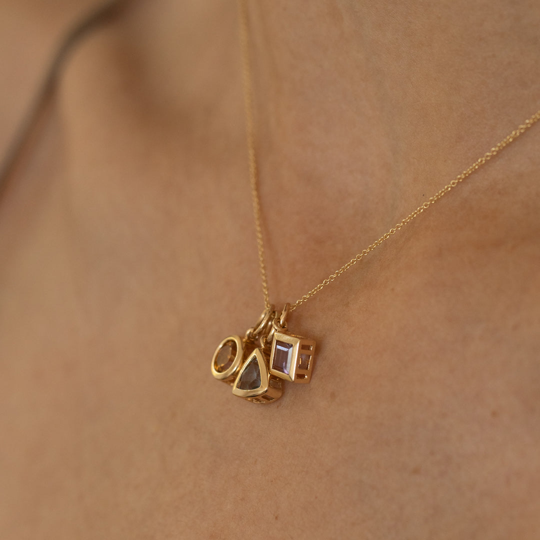 Trio of Glass Stone and 14K Gold Charms