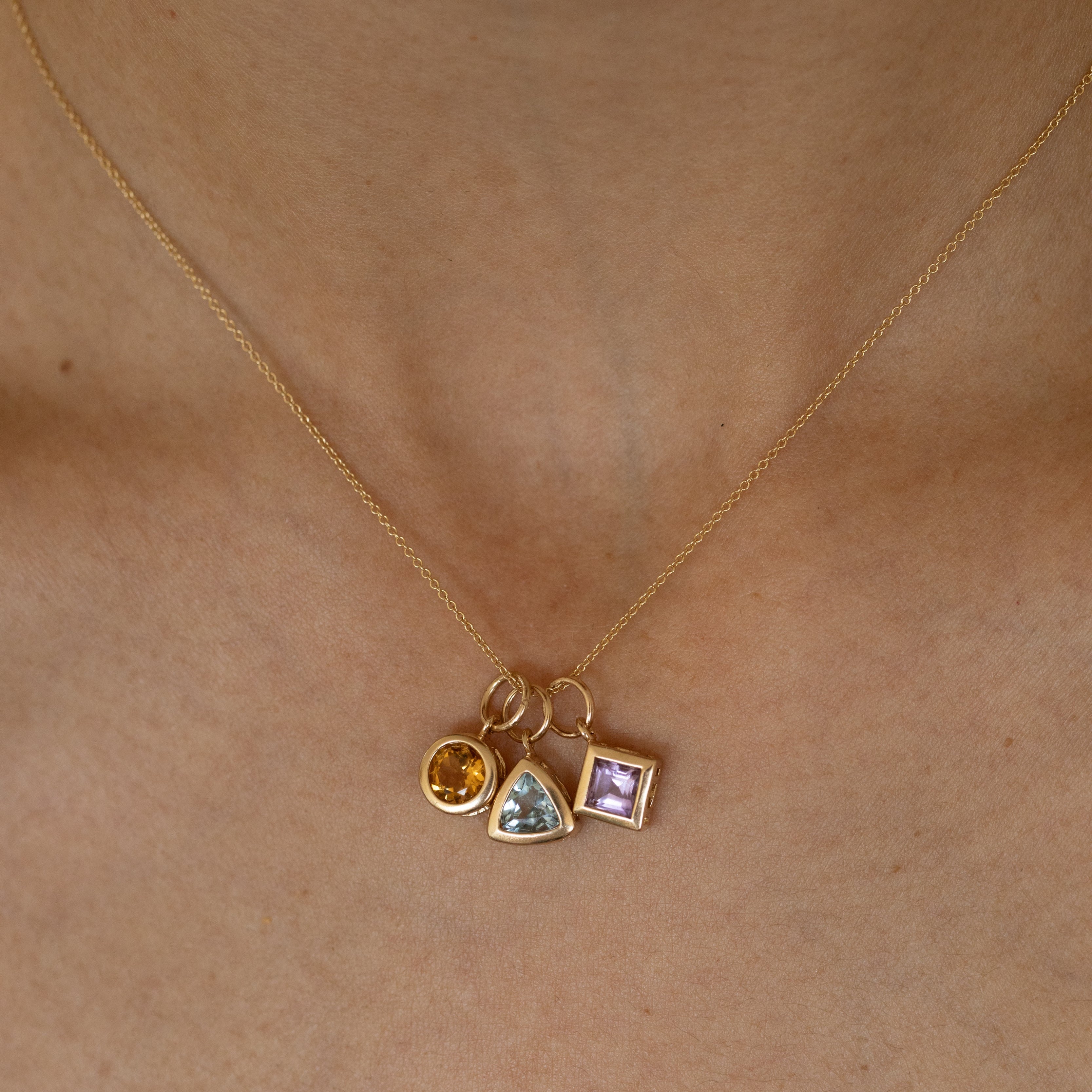 Trio of Glass Stone and 14K Gold Charms