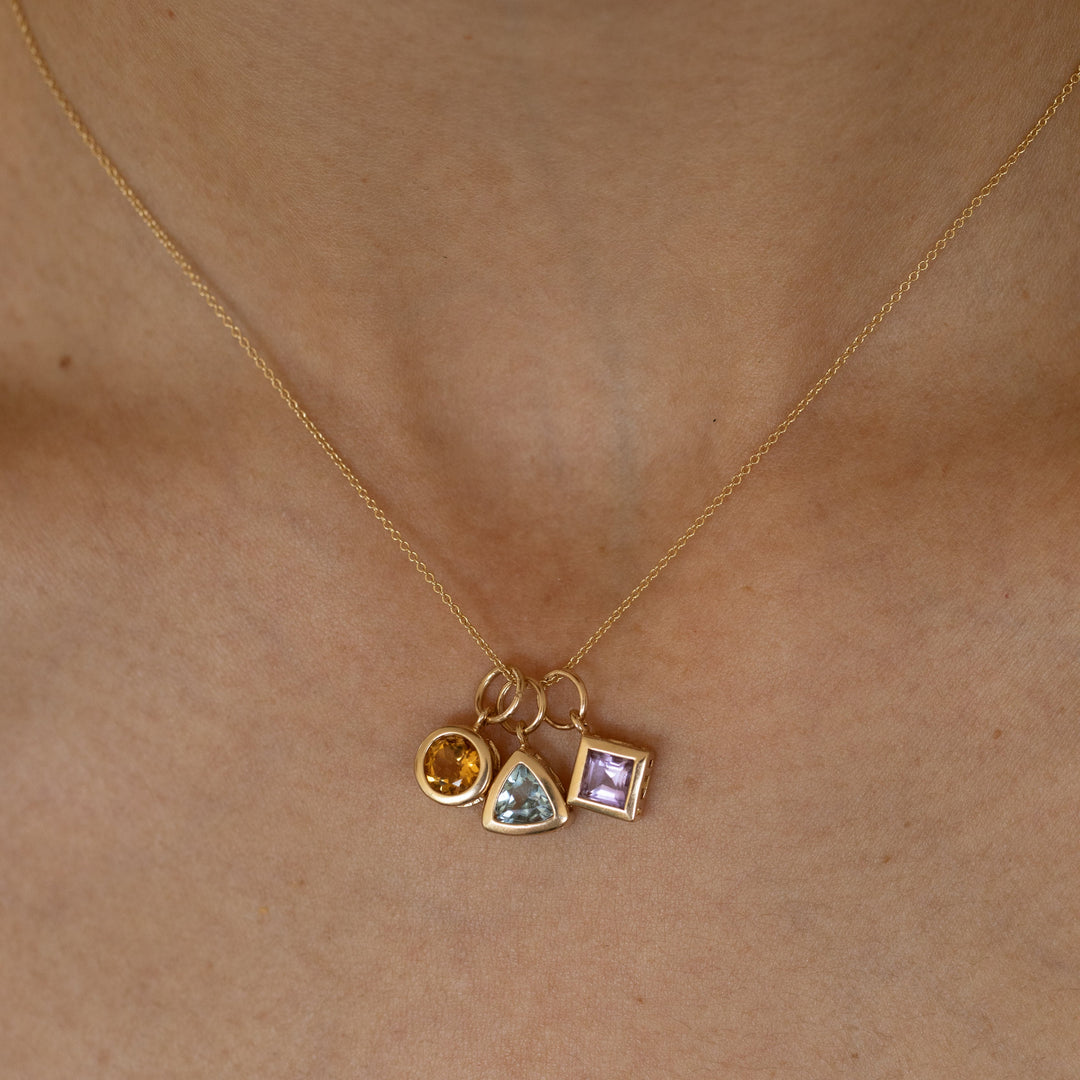 Trio of Glass Stone and 14K Gold Charms