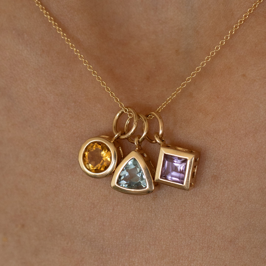 Trio of Glass Stone and 14K Gold Charms
