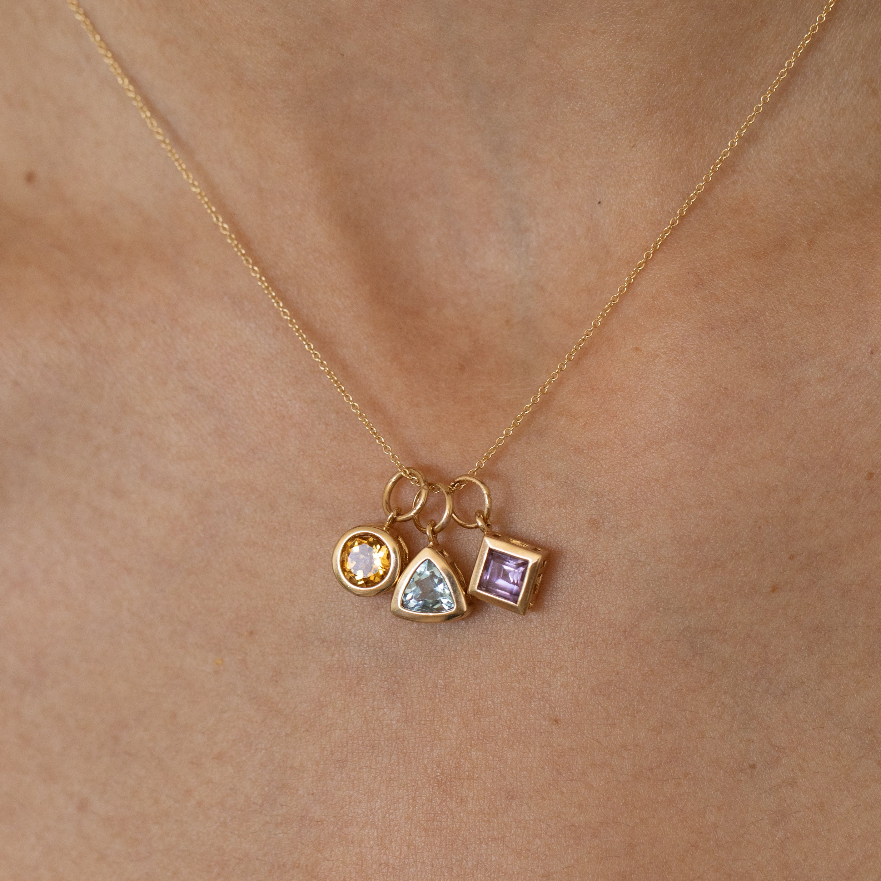 Trio of Glass Stone and 14K Gold Charms