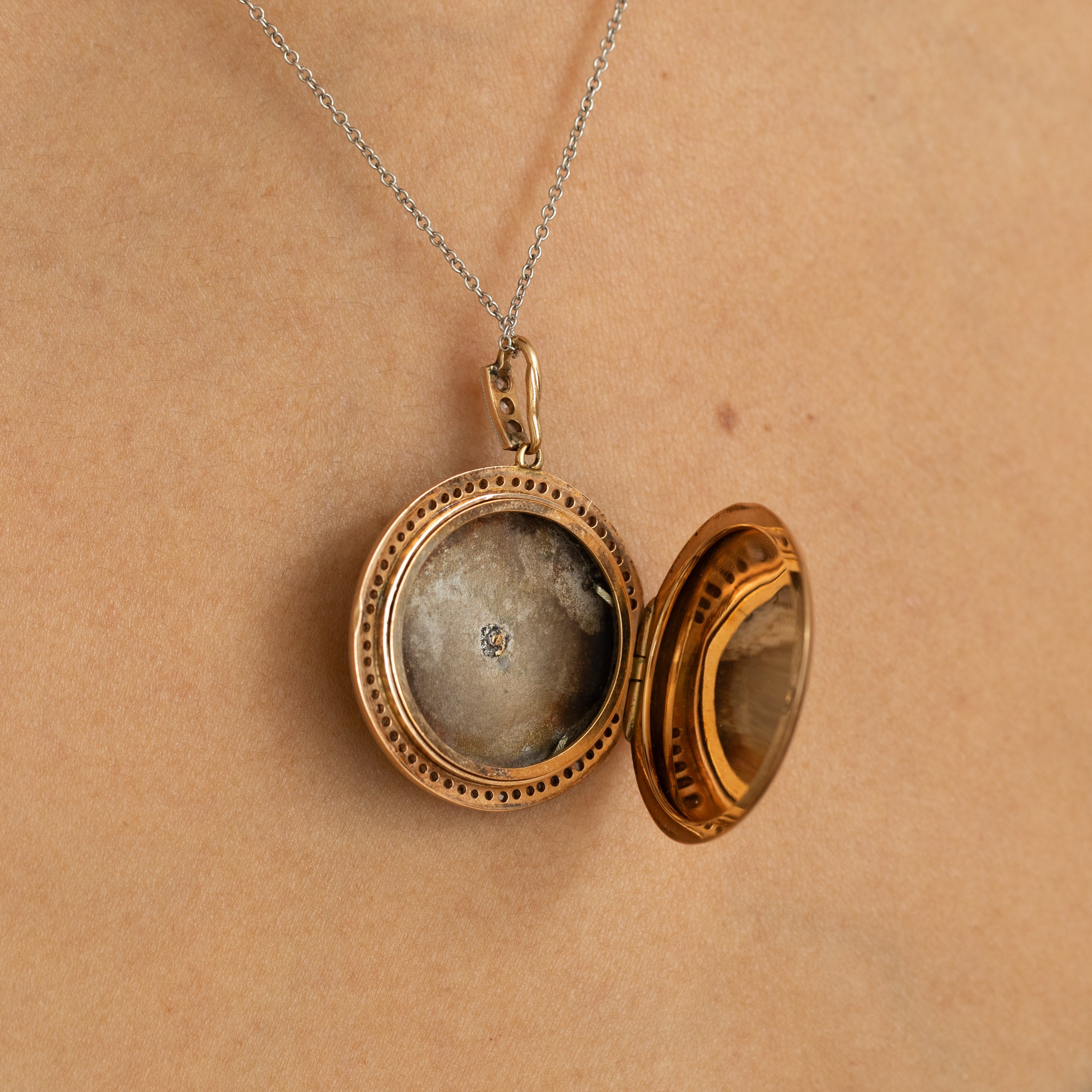 Early 20th Century Guilloche, Diamond, Pearl, Platinum, and 14K Gold Locket