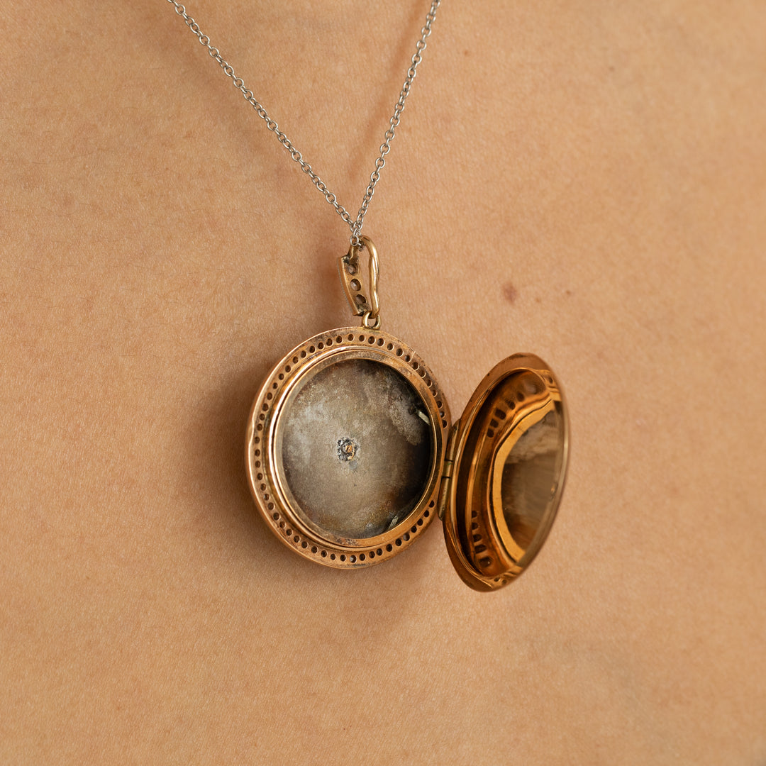 Early 20th Century Guilloche, Diamond, Pearl, Platinum, and 14K Gold Locket