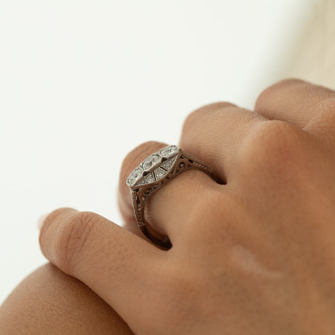 Transitional Three-Stone Platinum And Diamond Ring