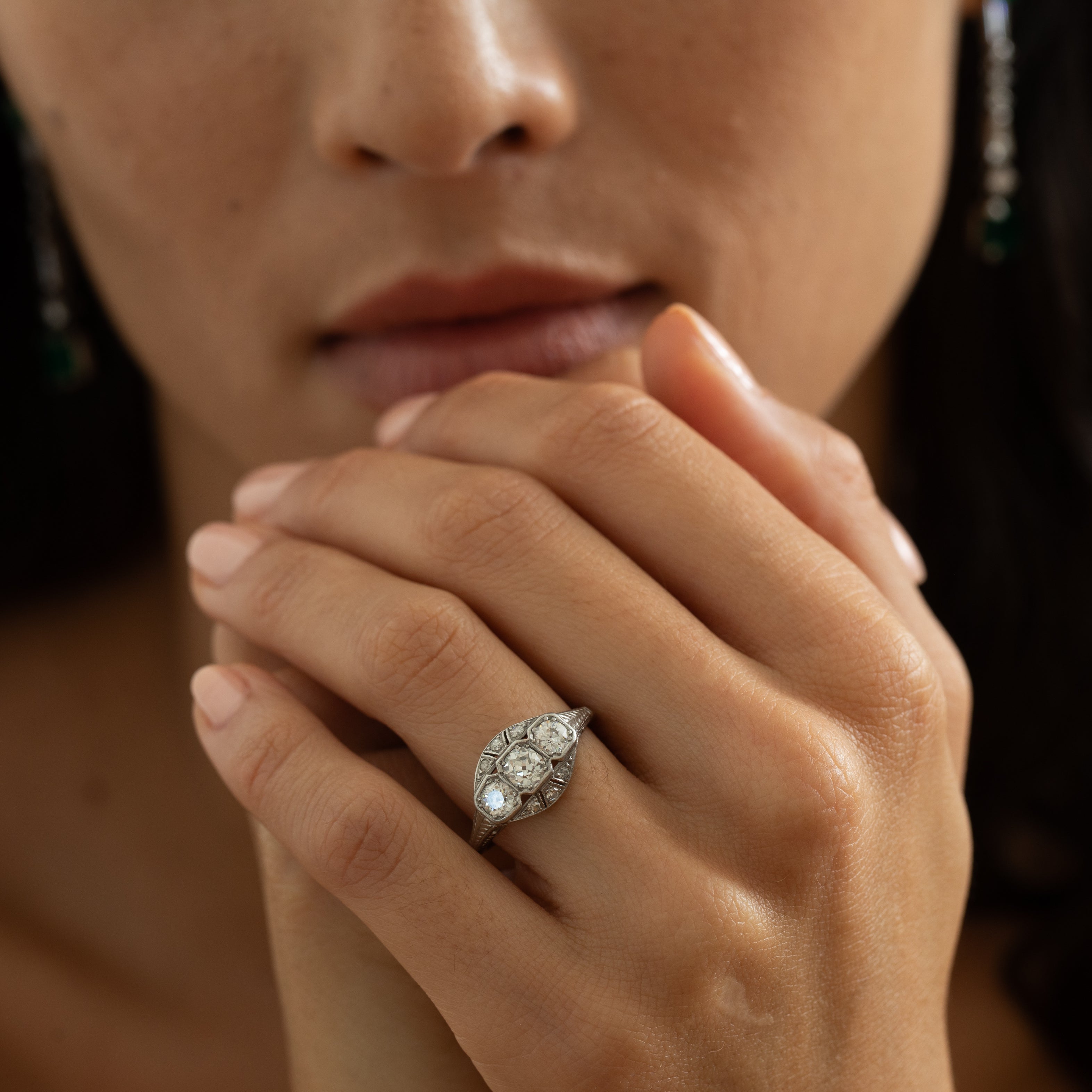 Transitional Three-Stone Platinum And Diamond Ring