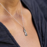Art Deco Diamond, Platinum, and Enamel Figure Charm