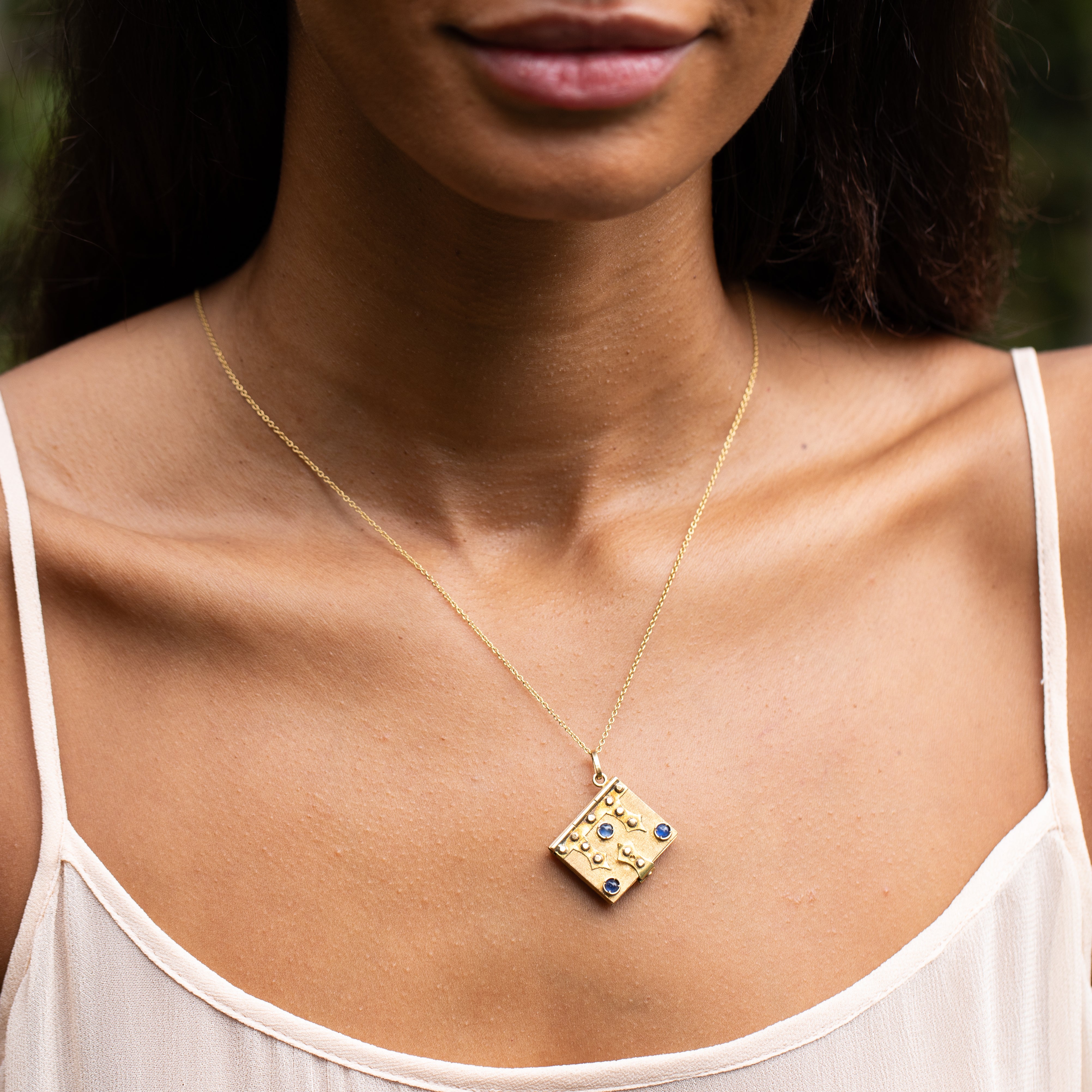 Blue Sapphires and 18K Gold Book Locket