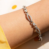 Edwardian Old Cut Diamond, Platinum, and 18k Gold Link Bracelet