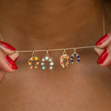 Opal, Ruby, And Gold Horseshoe Charm