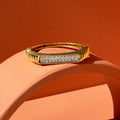 French 1970s Diamond and 18k Gold Ribbed Bangle Bracelet