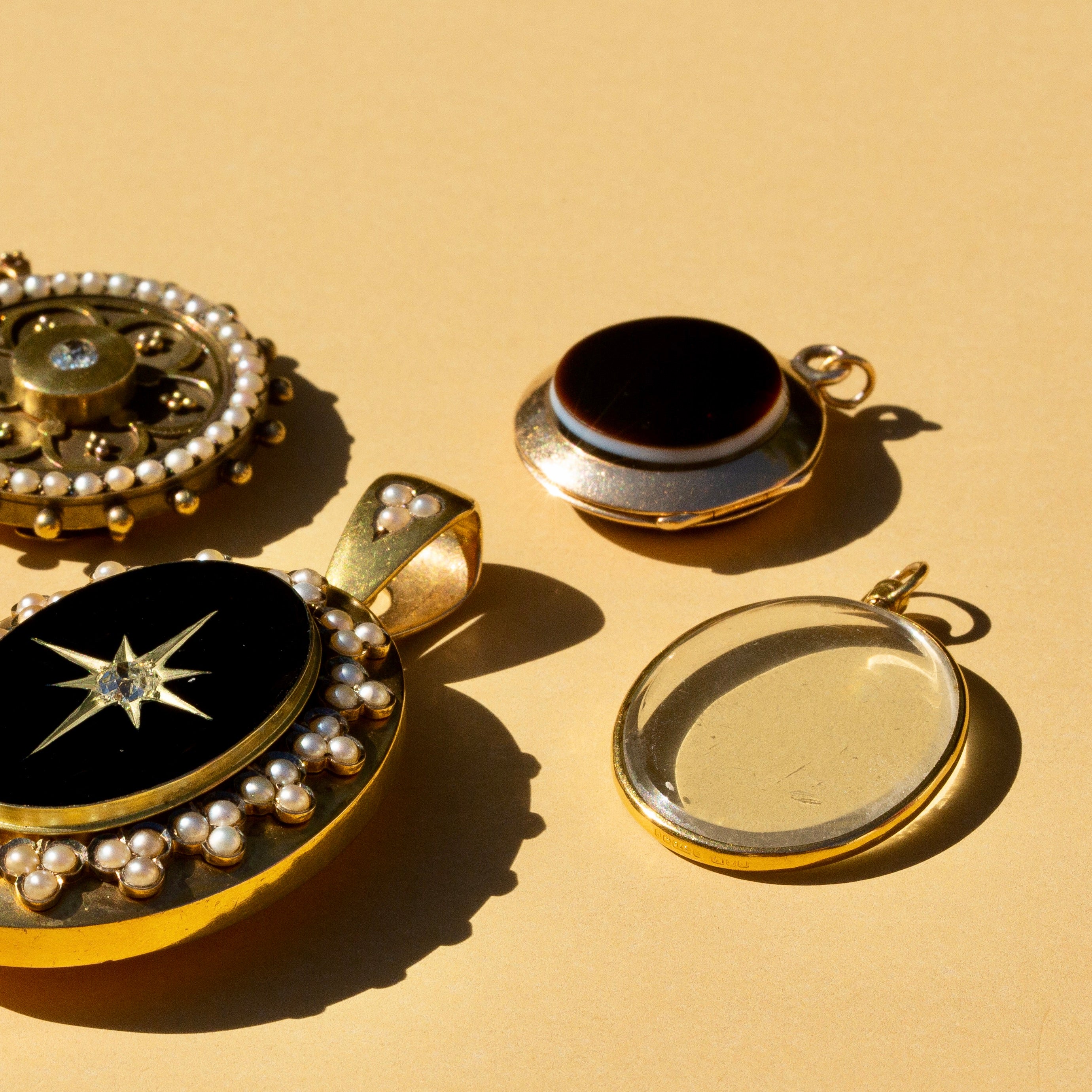Victorian Agate, Onyx, and 14k Gold Round Locket