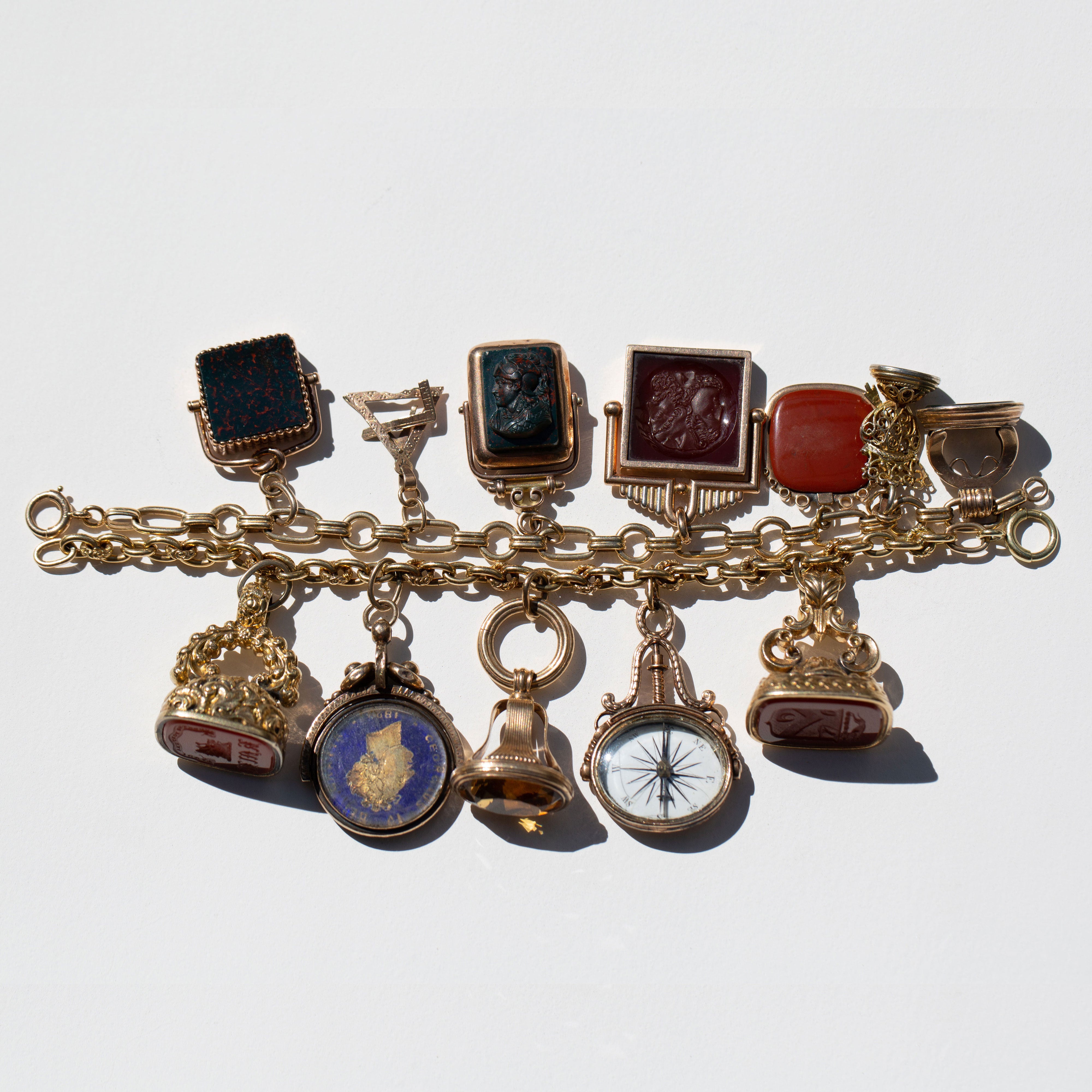 Victorian Bloodstone, Onyx, Carnelian, Sard, and Gold Fob Charm Bracelet