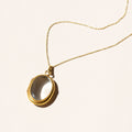 Clear Crystal And 14k Gold Locket Necklace