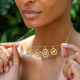 English Scorpio 9k Gold Oval Zodiac Charm