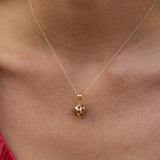 Ruby Starburst and 18k Gold Ball Charm