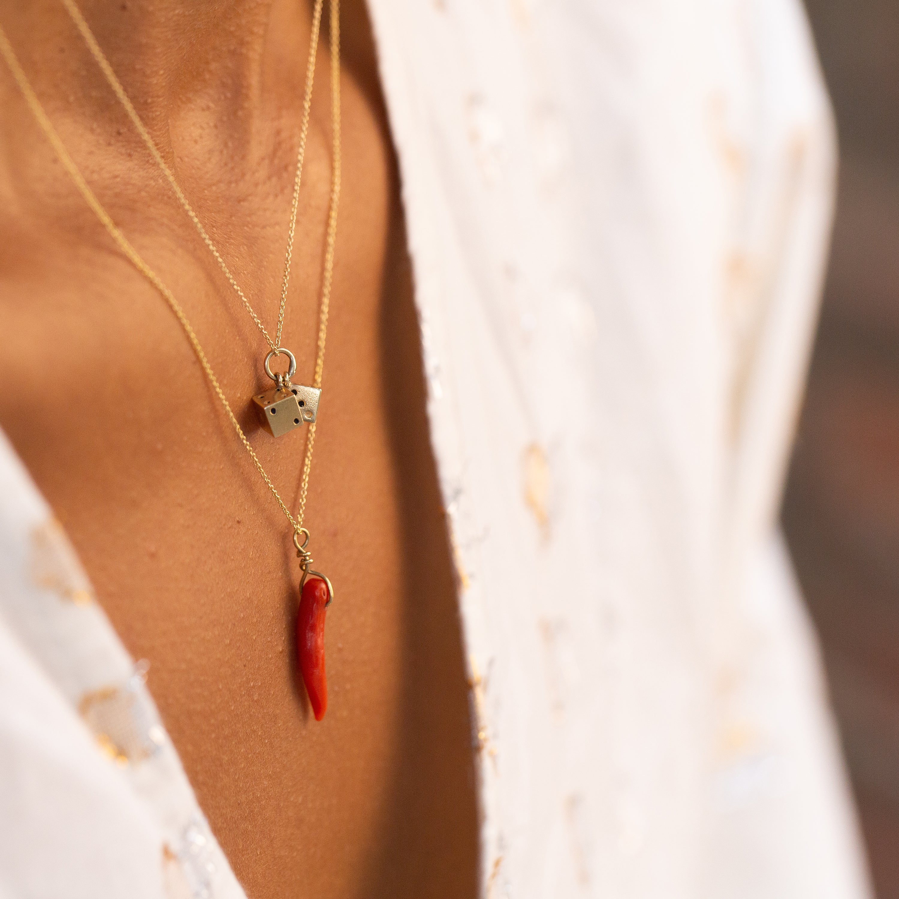 Coral Horn and 18k Gold Charm