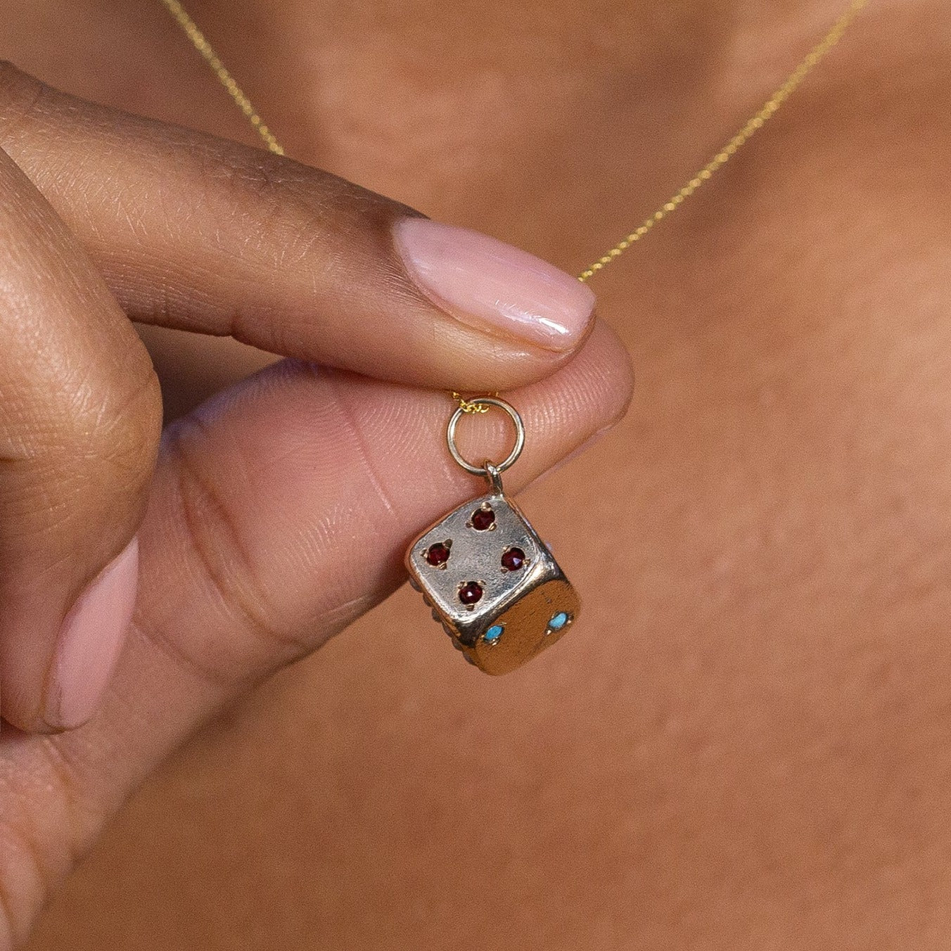 English Pearl, Turquoise, Garnet, and 9K Gold Dice Charm