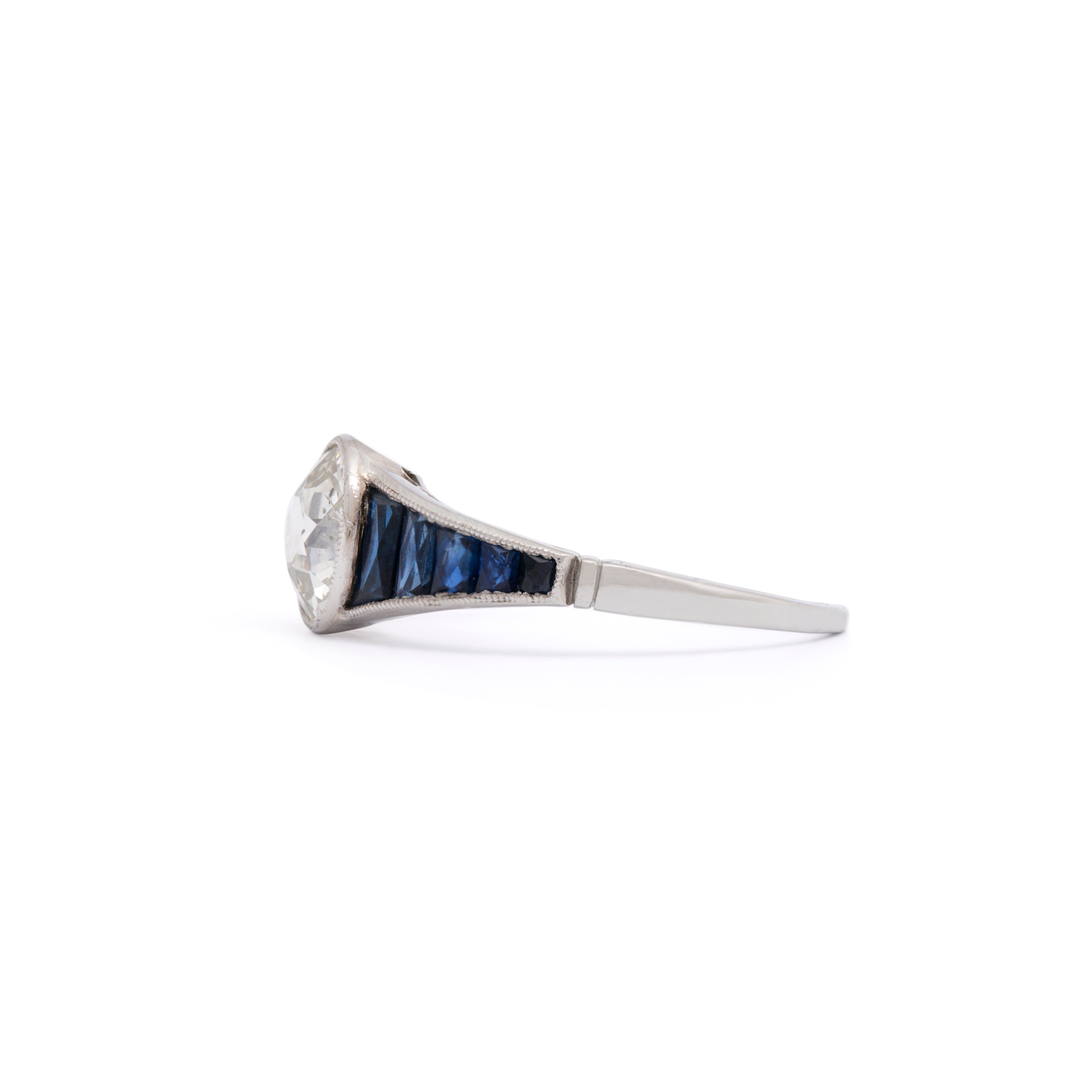 Art Deco 1.50 Carat Diamond and Sapphire Platinum Ring