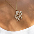 Victorian Diamond and Enamel 18k Gold Bow Pendant