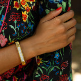 French 1970s Diamond and 18k Gold Ribbed Bangle Bracelet