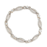 Edwardian Old Cut Diamond, Platinum, and 18k Gold Link Bracelet