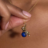 Movable Astronaut 9K Gold And Lapis Charm