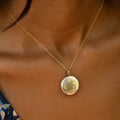 Accordion Folding 9k Gold Round Locket