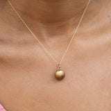 Movable 18k Gold and Pearl Shell Charm