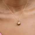 Movable 18k Gold and Pearl Shell Charm
